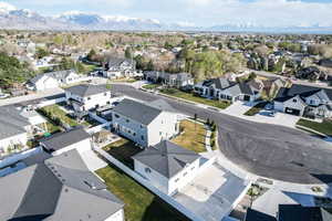 Drone / aerial view with a mountain view and a residential view