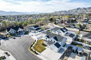 Aerial view featuring a mountain view and a residential view