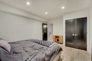 Bedroom featuring recessed lighting and light wood-style floors