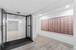 Interior space with visible vents and mail area
