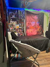 Bedroom featuring wood finished floors