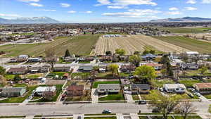 Birds eye view of property with a residential view and a mountain view