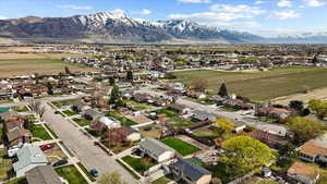 Drone / aerial view with a residential view and a mountain view
