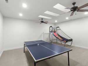 Rec room featuring recessed lighting, carpet flooring, and ceiling fan