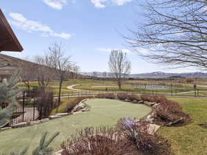 Community mini golf course overlooking tennis, pickleball and volleyball courts