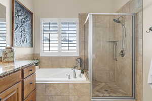 Separate tub and shower in primary bathroom