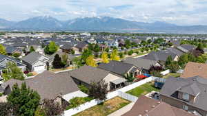 Aerial view of residential area with a mountain backdrop