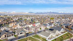 Aerial views of front of house and Kennecott Copper Mine in the Distance