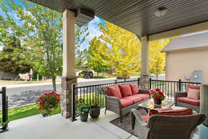 Porch featuring an outdoor hangout area