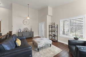 Plantation shutters throughout the home, including the large front window.