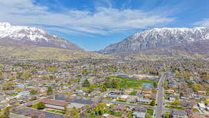 Drone / aerial view with a mountain view and a residential view
