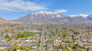 Drone / aerial view featuring a mountain view and a residential view