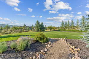 View of yard featuring a mountain view