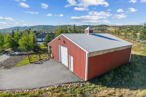 View of outdoor structure with an outbuilding and a mountain view