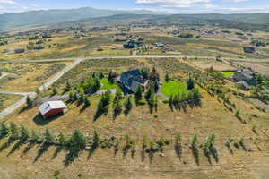 Drone / aerial view with a rural view and a mountain view