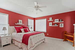 Brand new carpet in primary bedroom, lots of natural light, ceiling fan and trey ceiling