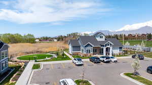 Clubhouse with outdoor pool and pet area