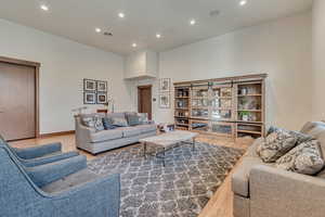 Living room featuring recessed lighting and wood finished floors