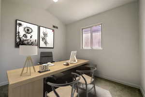 Home office featuring baseboards, visible vents, vaulted ceiling, and dark carpet
