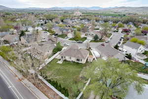 Aerial view featuring a mountain view and a residential view