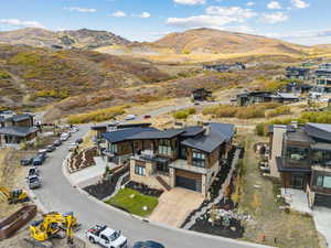 Aerial view of residential area featuring a mountain backdrop