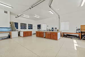 Garage featuring visible vents