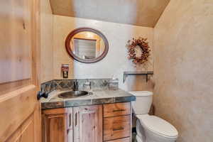 Bathroom featuring toilet and vanity