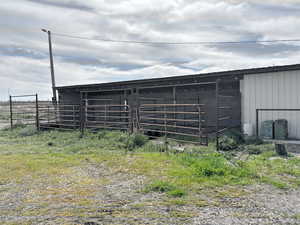 View of outbuilding with an outdoor structure