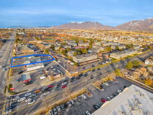 Birds eye view of property with a mountain view