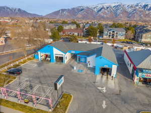 Aerial view featuring a residential view and a mountain view