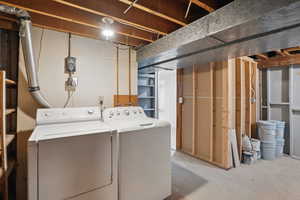 Laundry room featuring independent washer and dryer