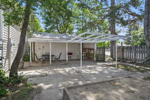 View of patio with outdoor dining area