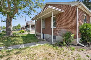 View of home's exterior with brick siding