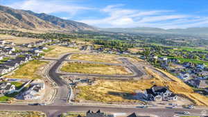 Drone / aerial view with a mountain view and a residential view