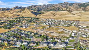 Birds eye view of property featuring a residential view and a mountain view