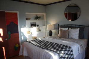Bedroom featuring crown molding