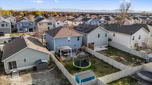 Drone / aerial view featuring a mountain view and a residential view