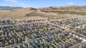 Aerial view featuring a residential view and a mountain view