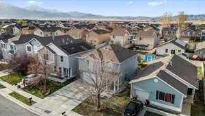 Aerial view featuring a mountain view and a residential view