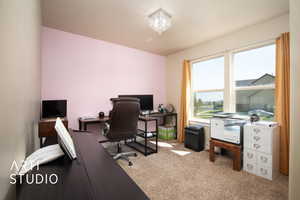 Main floor bedroom being used as an office.