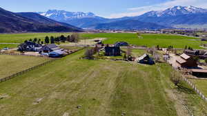 Drone / aerial view featuring a rural view and a mountain view