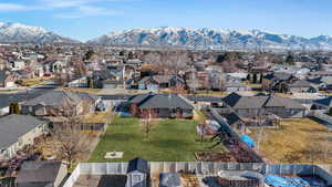 Drone / aerial view featuring a residential view and a mountain view