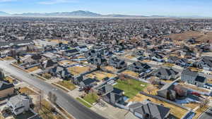 Drone / aerial view with a mountain view and a residential view