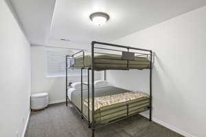 Bedroom featuring carpet