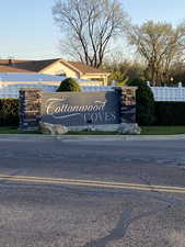Community / neighborhood sign with fence