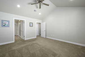 Unfurnished bedroom featuring baseboards, recessed lighting, carpet flooring, visible vents, and high vaulted ceiling