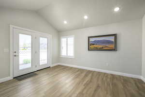 Interior space with recessed lighting, light wood-type flooring, and baseboards