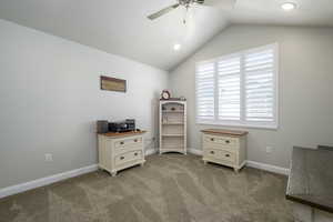 Bedroom with ceiling fan, recessed lighting, carpet floors, lofted ceiling, and baseboards