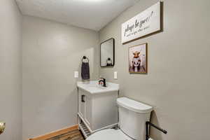 Bathroom featuring toilet and vanity
