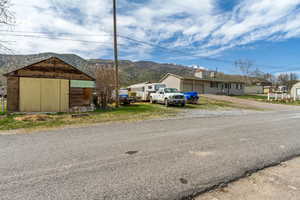 View of road with a mountain view and a residential view